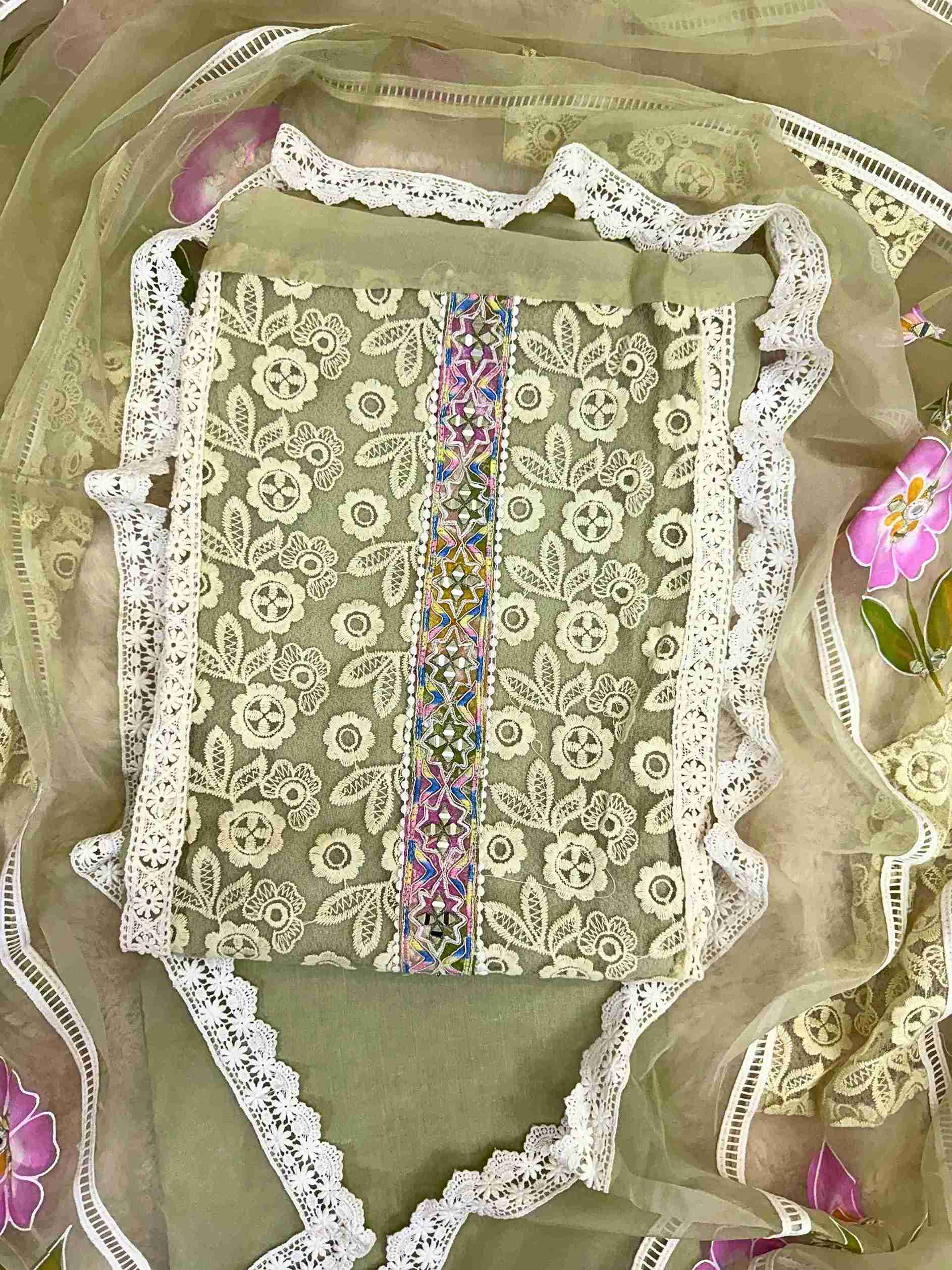 party wear unstitched suits for women on crotia work net and hand painted dupatta